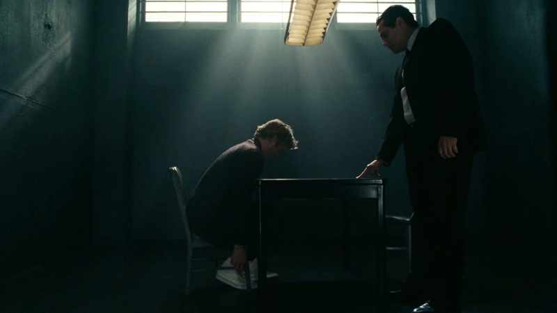 [ Handcuffs clank ]
