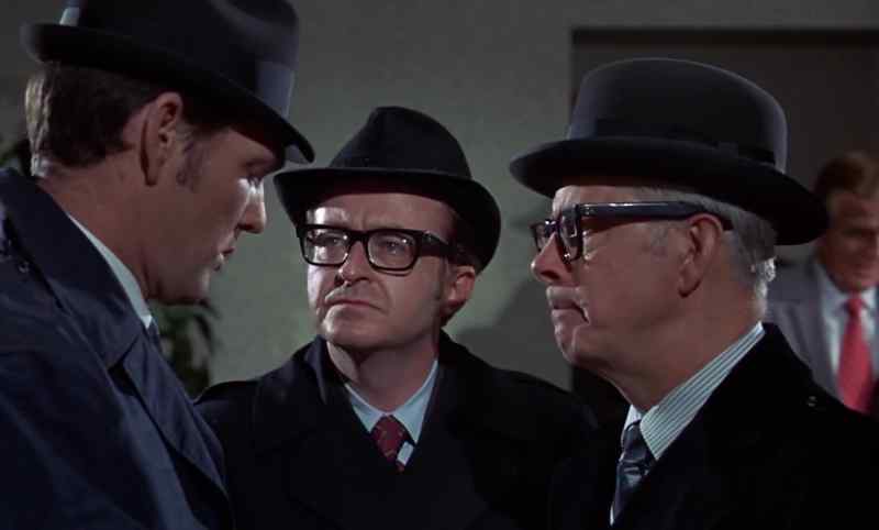 HAS THE MAN FROM THE JUSTICE DEPARTMENT ARRIVED YET ?