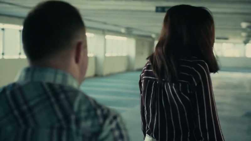 He has a pistol, and he abducts her