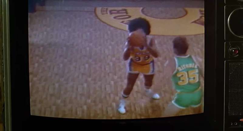 He is actually 6'5 With the Afro 6'9