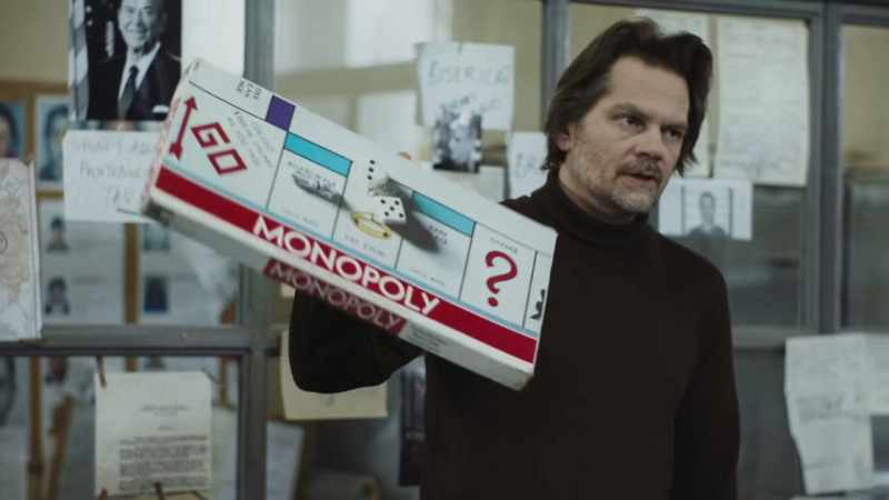 He carries a Monopoly board game