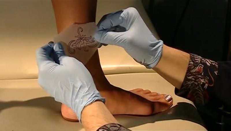 HE CLEANS THE CUSTOMER'S SKIN