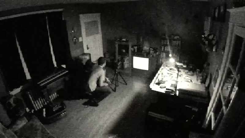 He crouched down in front of the mirror