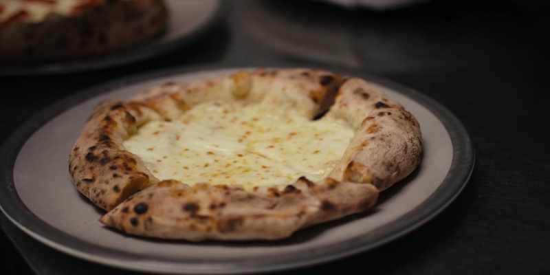 He doesn't have the tomato base. He has the mozzarella base