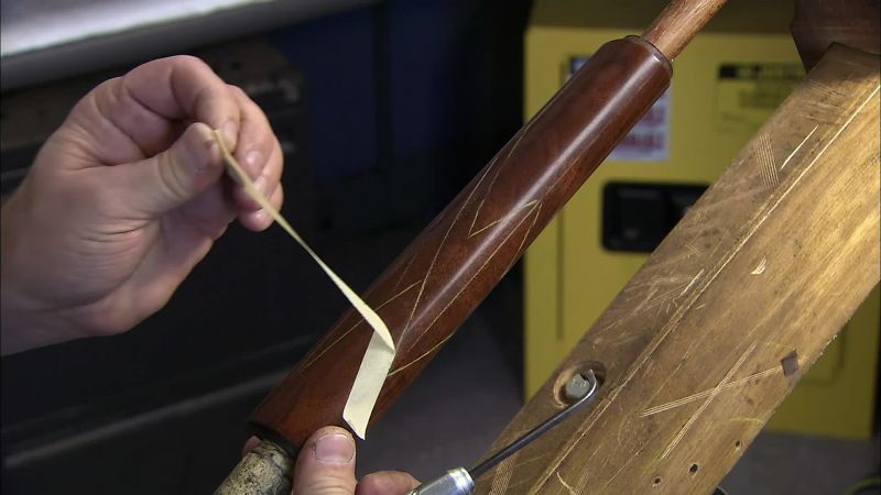HE ETCHES A SERIES OF GROOVES