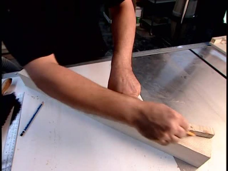 HE FLIPS THE PIECE OVER