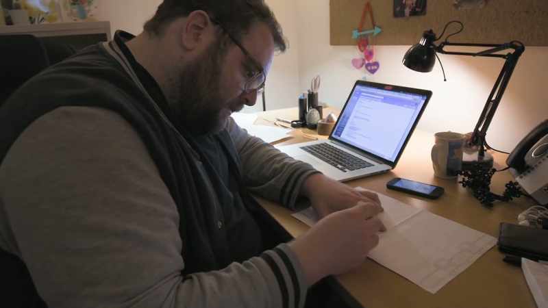 He gets floor plans printed out that he cuts up