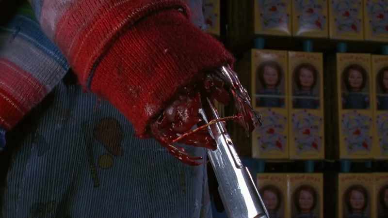 He gets his hand cut off and shoves a knife down his arm
