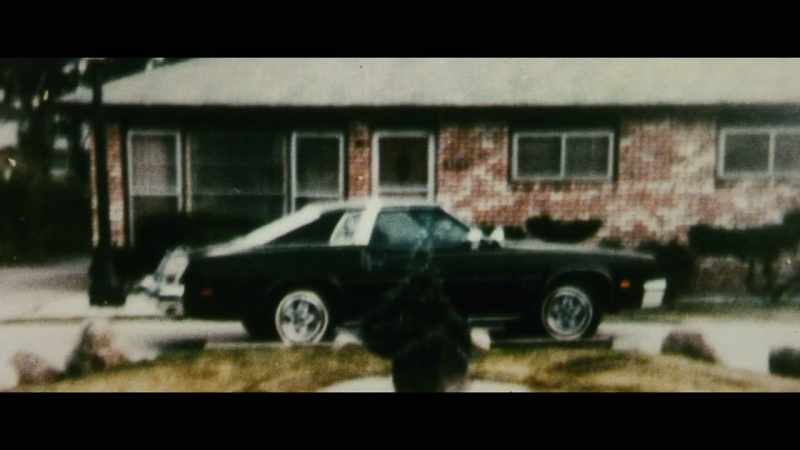 He had this dark Oldsmobile with a spotlight on it