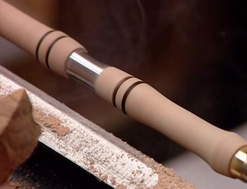 HE HIGHLIGHTS THE GROOVES BY USING THE HEAT