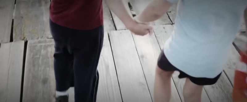 He was holding my hand, he was just going