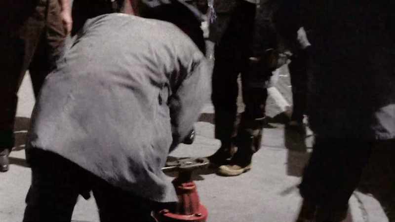 HE IS FILMING AS THE POLICE