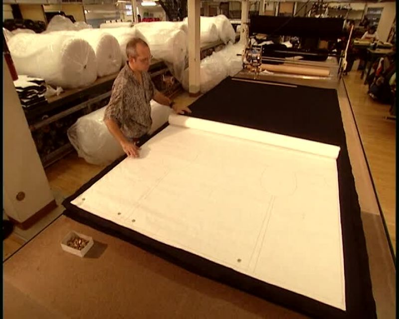 HE LAYS OUT THE PATTERN