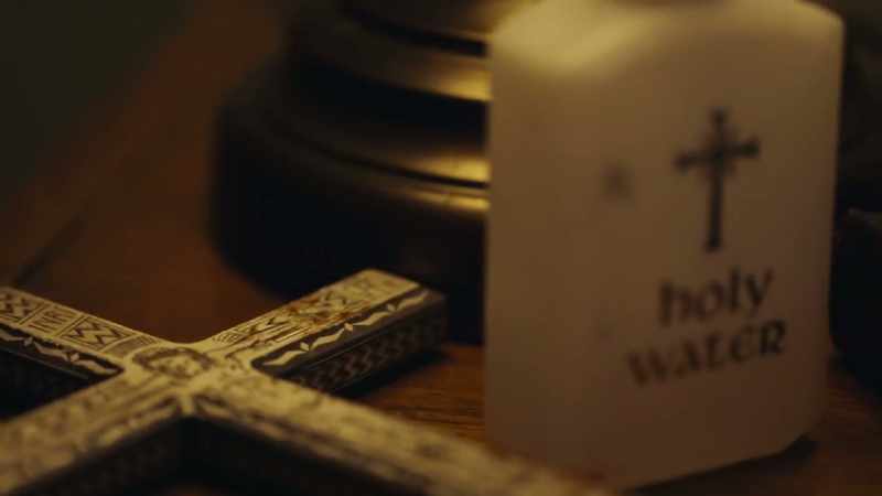 He had left a crucifix and some holy water at the bedside