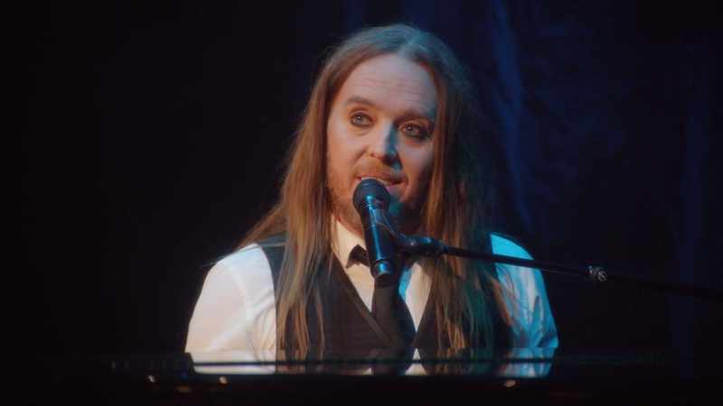 �� He looks at me intensely