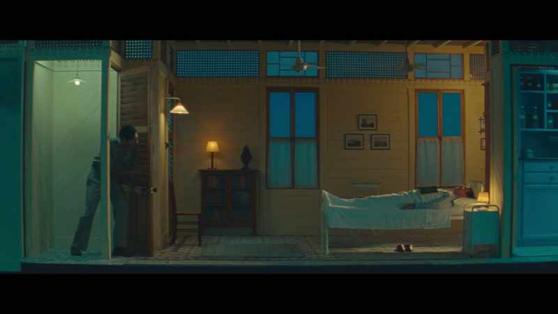 He was lying in bed awake. He didn't move or even turn his head