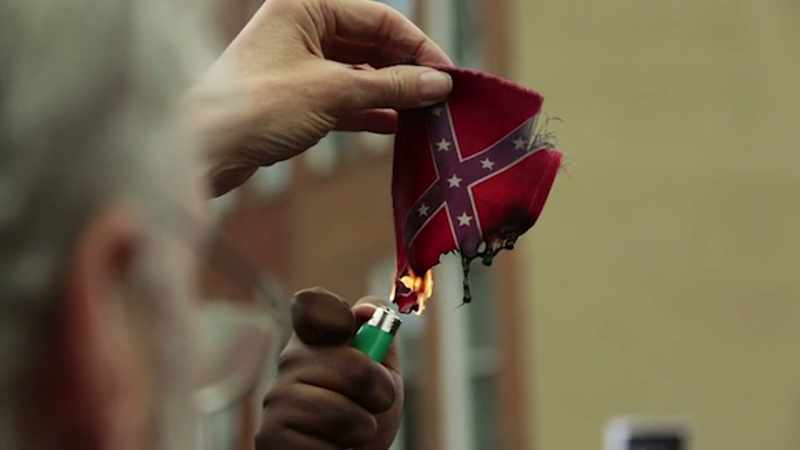 >> HE MAY BE A RACIST, BUT AT