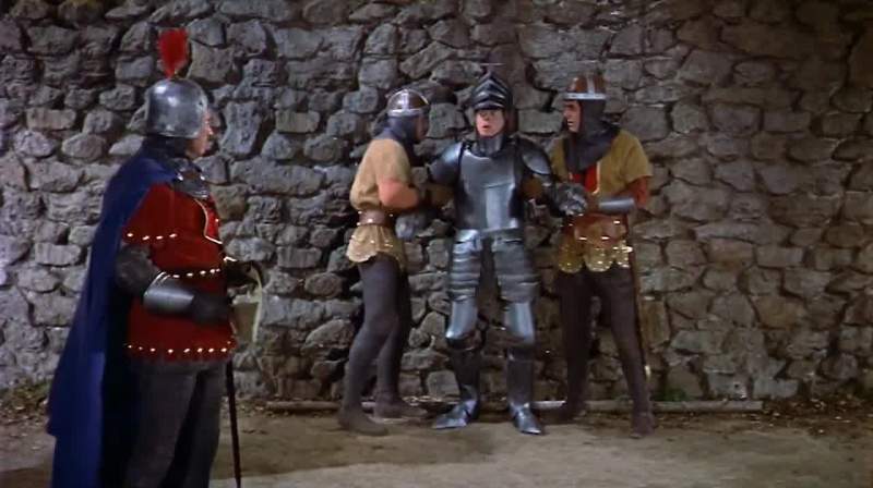 He must scale a stone wall in full armor