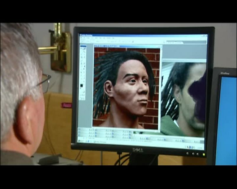 HE PAINTS IN THE BROWS WITH A STYLUS