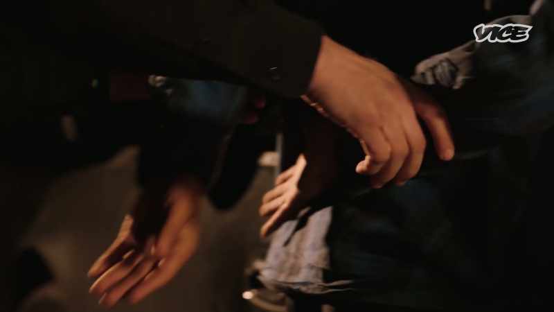He puts my hands behind my back