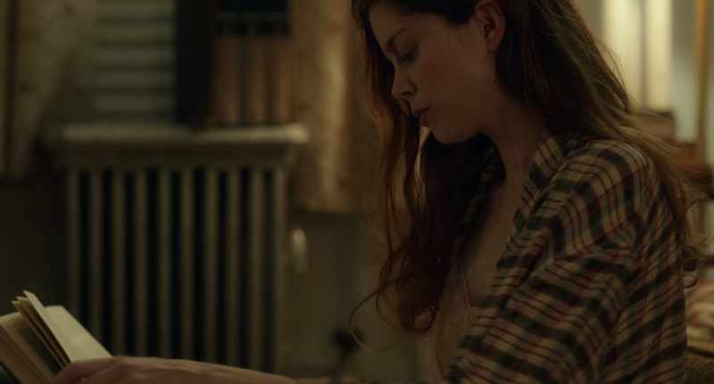 He sat on her, pinned her arms to the ground