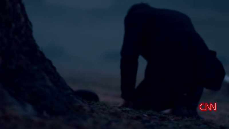 HE STAYED AT HER GRAVE SITE IN INCLEMENT WEATHER