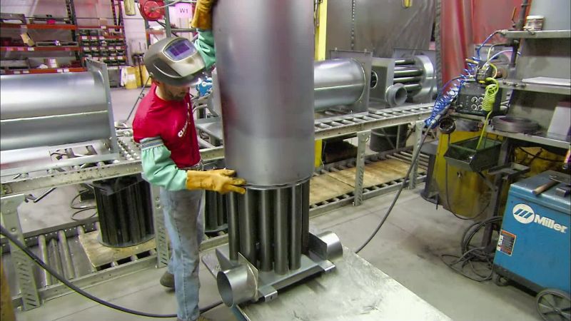 HE THEN SETS A COMBUSTION CHAMBER