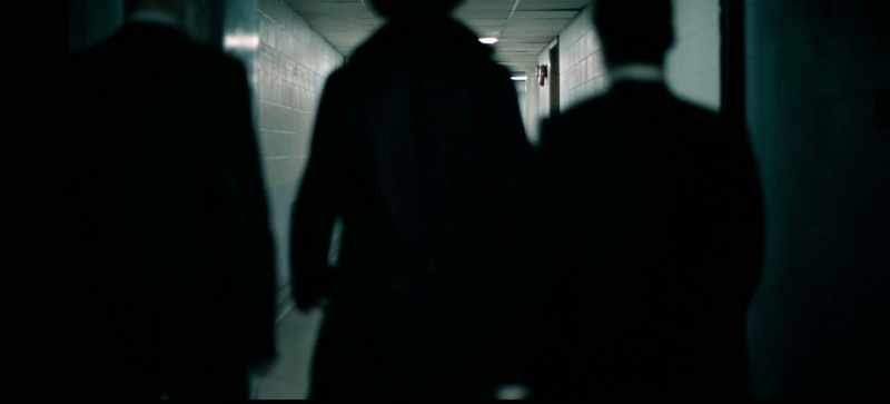 He wore a black trench coat before all that stuff was there