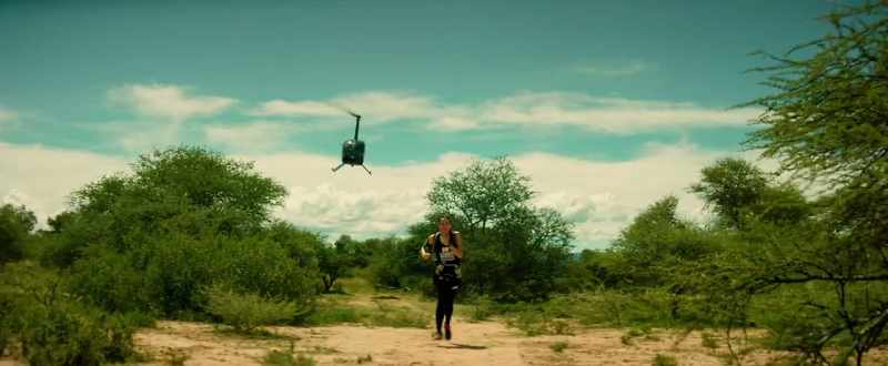 (helicopter blades whir)