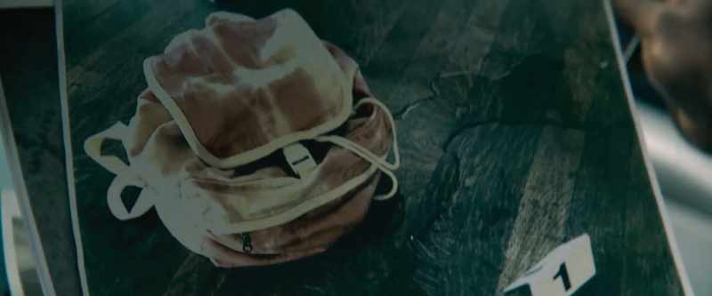 Her backpack. How'd her backpack get wet?
