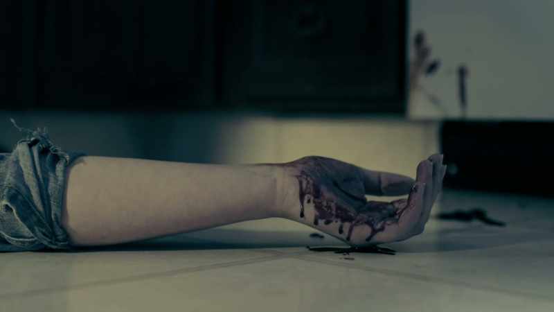 Her throat had been cut in a manner that would indicate