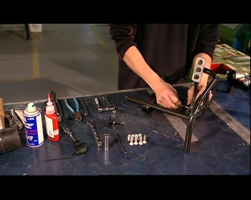 HERE, A WORKER ASSEMBLES THE 50 PARTS