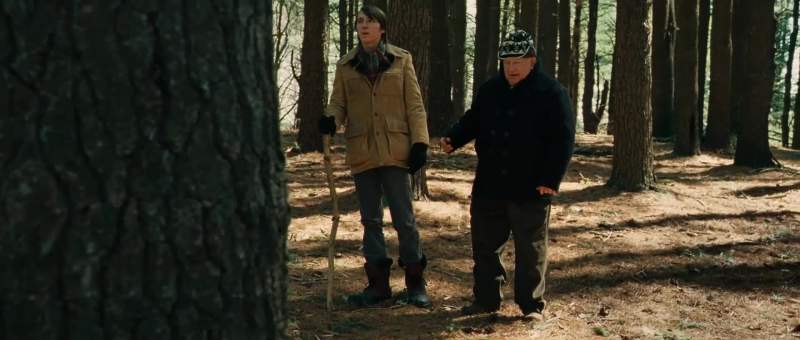 Here we are walking together in the woods