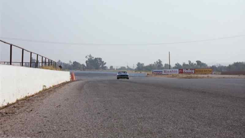 'Here she comes. Out in number 43 to complete the first lap.'