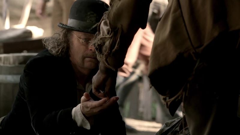 Here. Take that for his care and burying