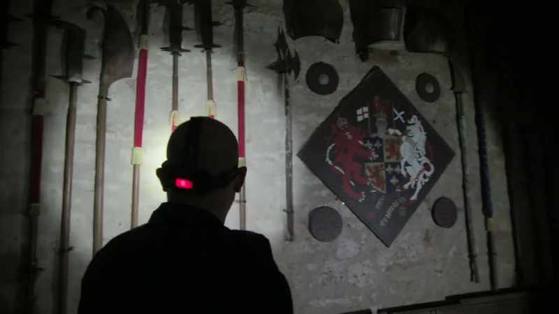 He's assessing what paranormal detection equipment