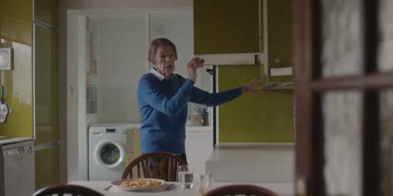 He's feeding someone