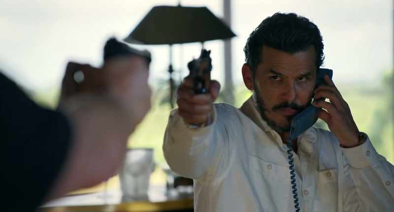 He's here, and he has a gun pointed at me