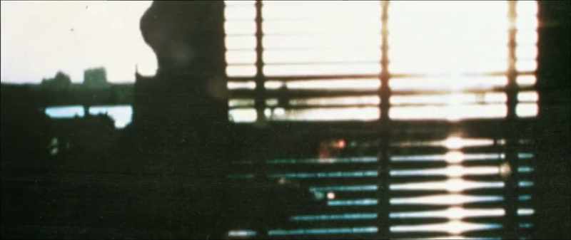 He's looking at his reflection. Valerie is coming towards him