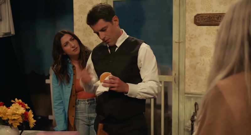 He's taking two donuts!