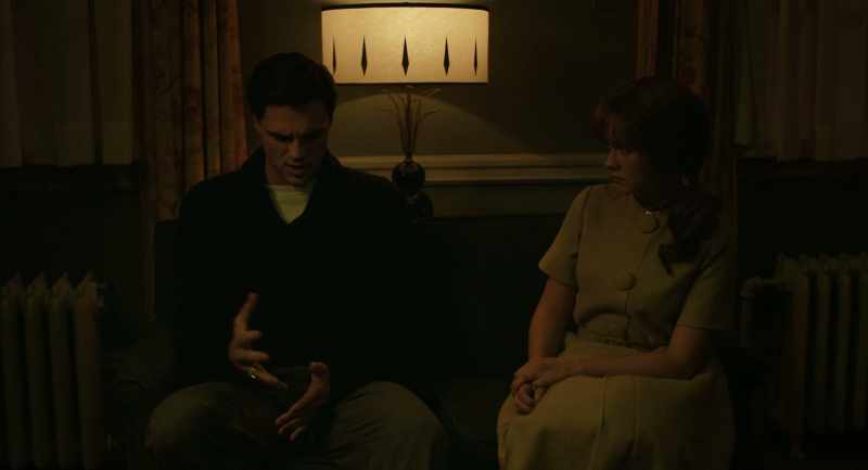 He's under her spell. She's trying to turn him