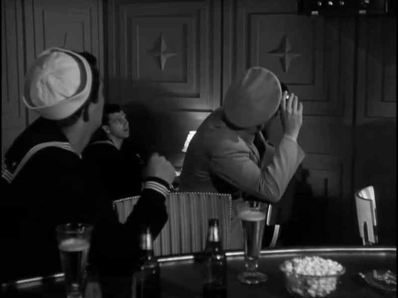 Hey, he's kissing my dame