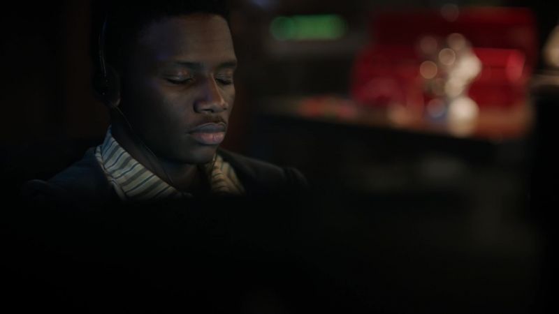 [hip-hop playing over earphones]
