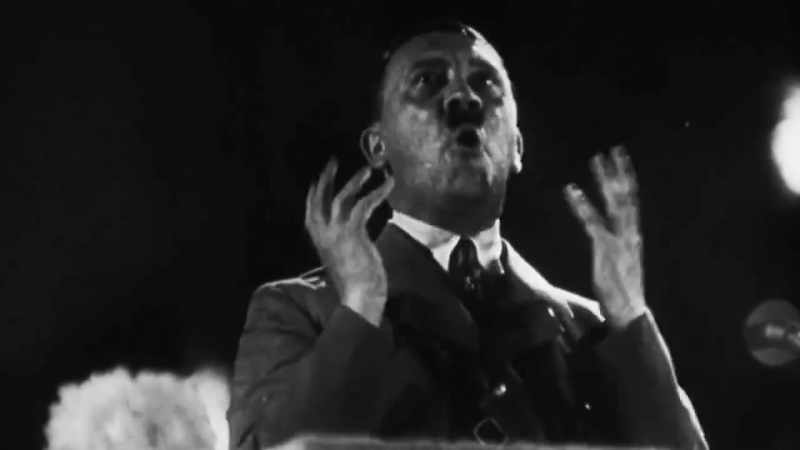 [Hitler shouting] - [crowd cheering]