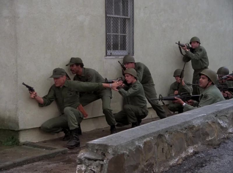 Hold your fire. They've got Corporal Brown