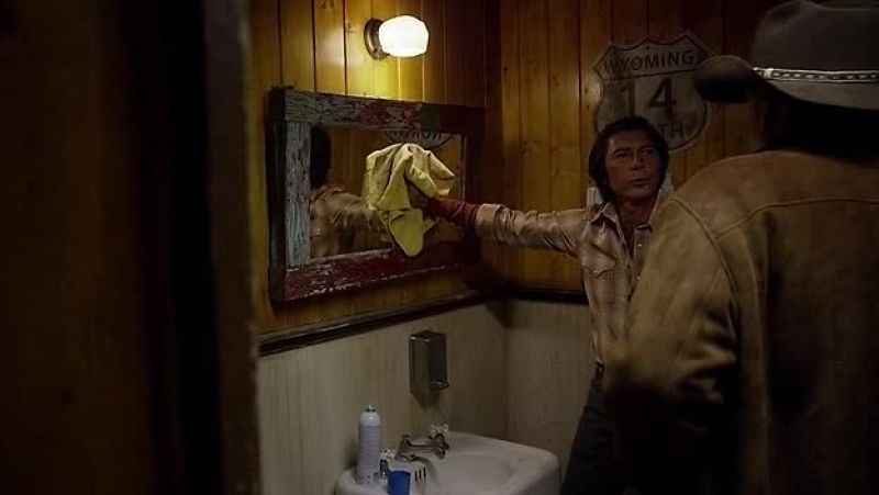 Hooligans have been writing graffiti on the mirror in permanent marker