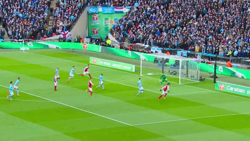 Hopped on by Ramsey, steadying himself was Özil
