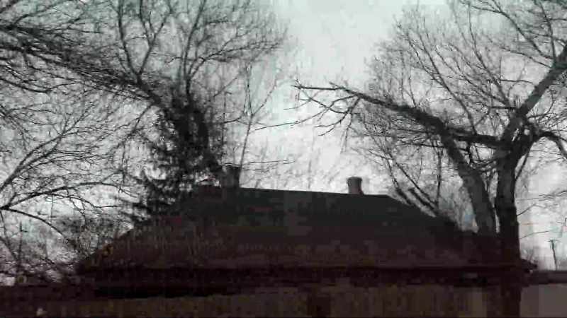 Houses hit by shells burn
