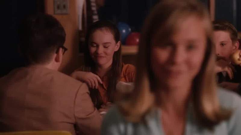 How could she sit there and laugh and look so beautiful