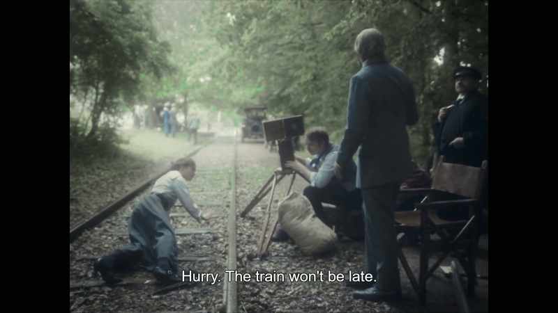 Hurry, the train won't be late. - Closer to the rails